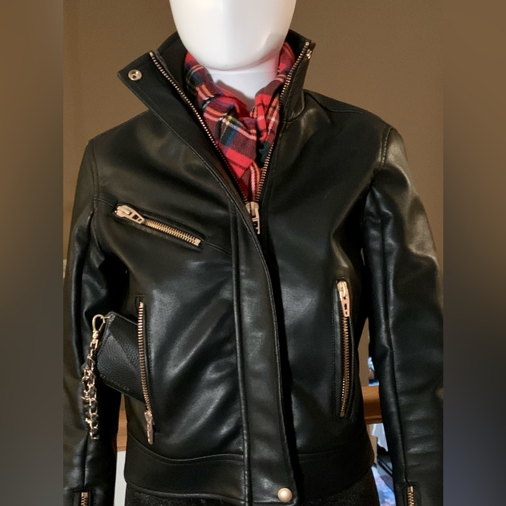 BLANKNYC Thick Black Faux Leather Motto Jacket with Brushed Rosegold Hardware.
